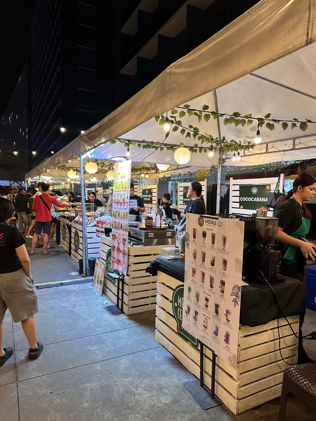 Evening food stalls and visitors at the Shore-Eats bazaar