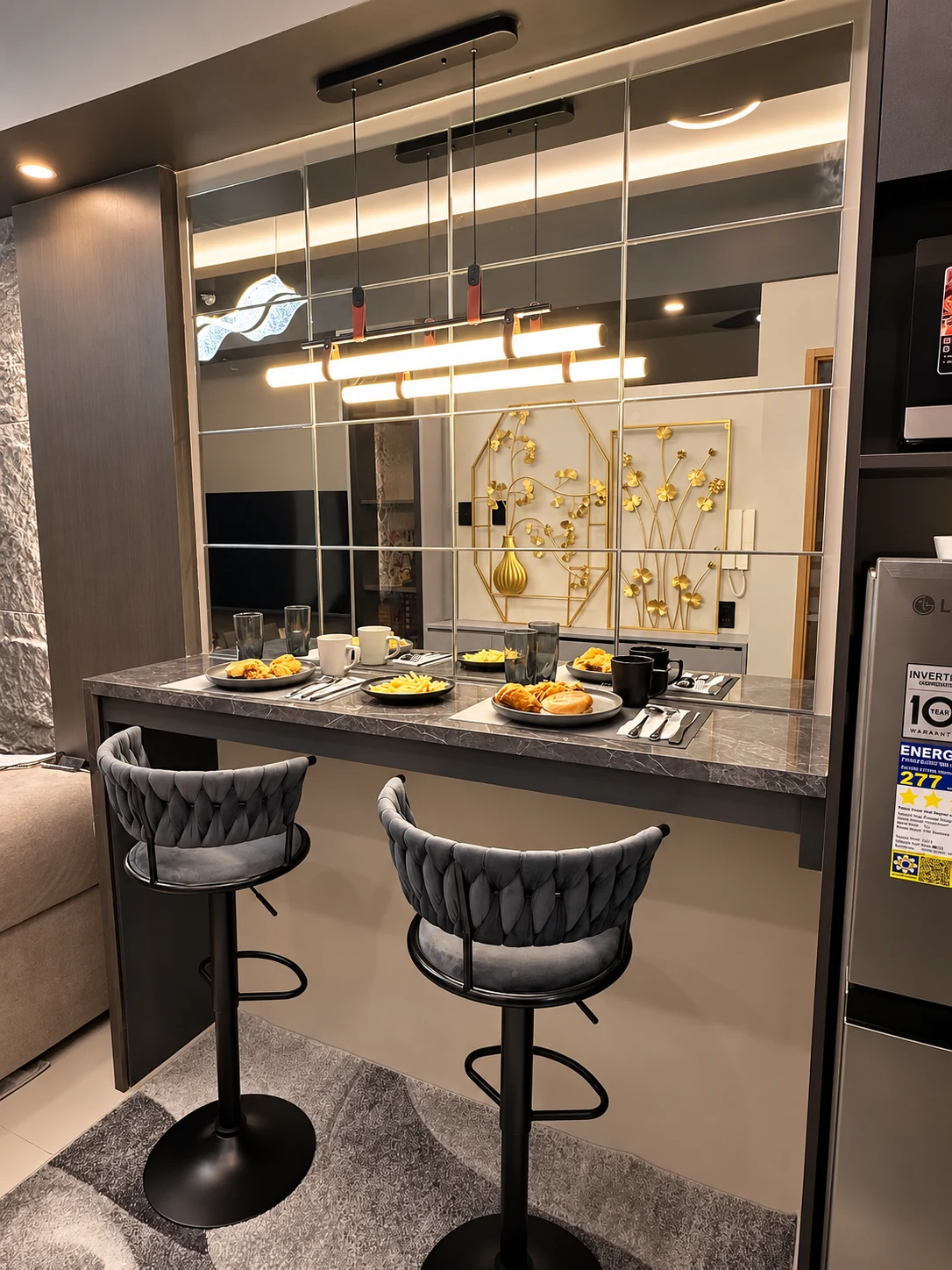Dining counter and seating inside the actual condo