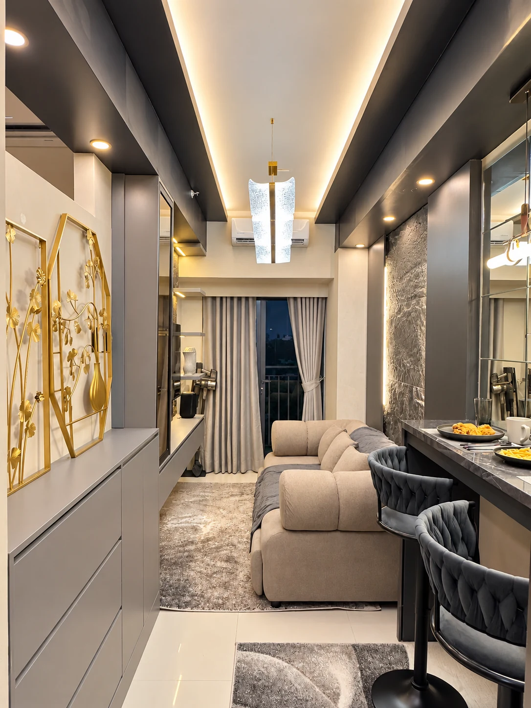 Actual living room at MONO/LITH with charcoal walls, sofa and illuminated ceiling