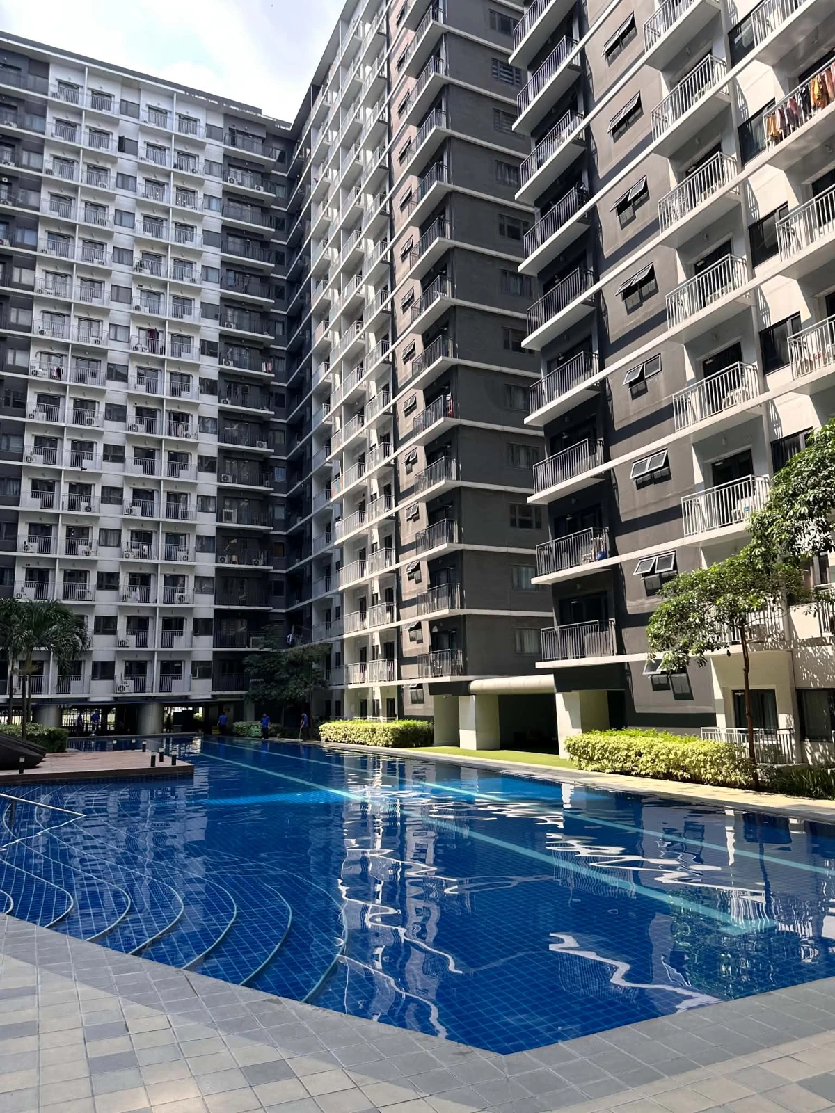 Actual Tower 3 swimming pool photographed from pool level with buildings above